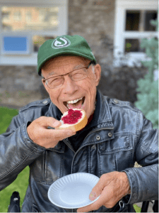 Happy resident eating