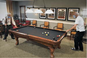 Residents playing pool
