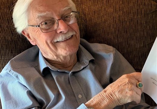 A picture containing person, sofa, indoor