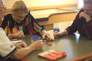 seniors playing cards, fun times